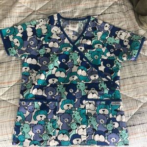Scrubs, fits big.